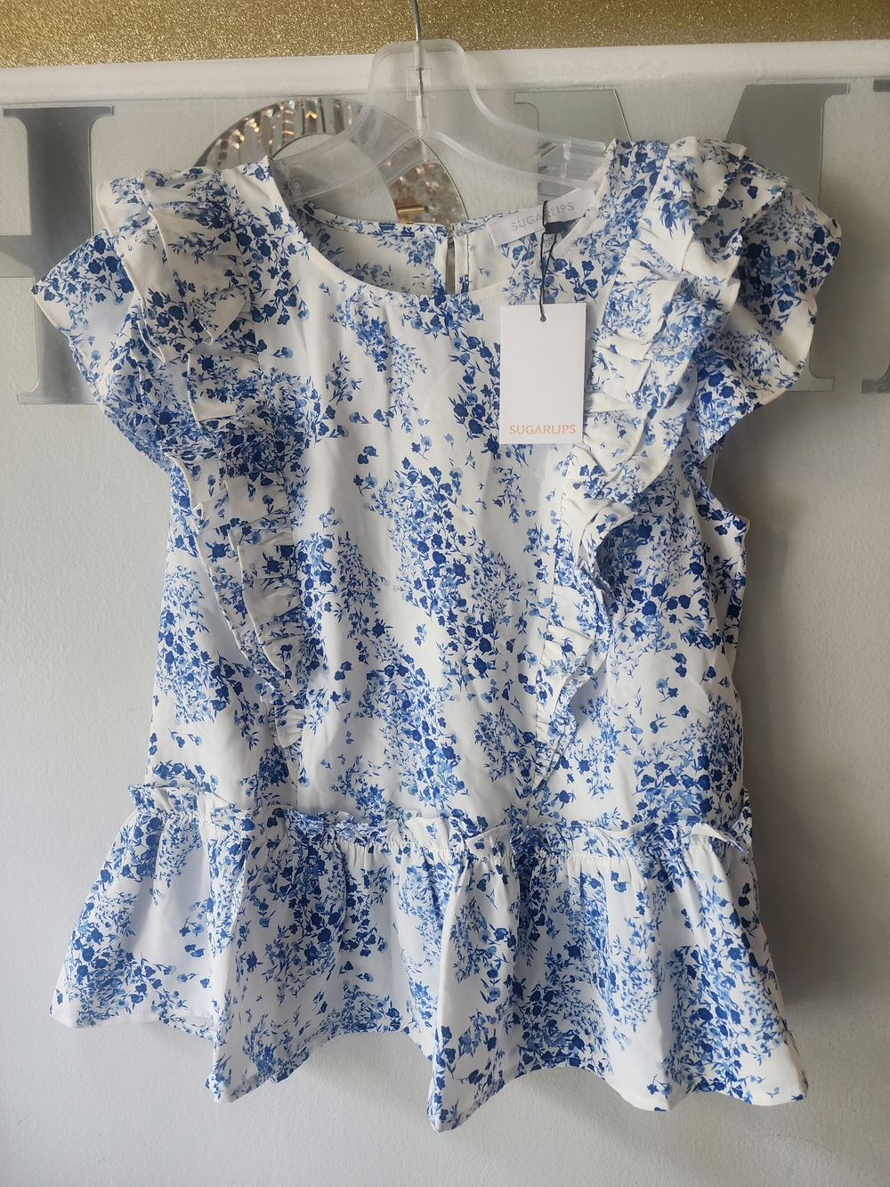 Sugarlips White Top with Blue Floral Ruffle Peplum